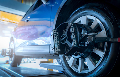 Tire is aligned in EF Tire and Auto Repair shop in Pompano Beach