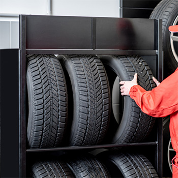 Car tire being chosen for a car tire replacement installation in Pompano Beach